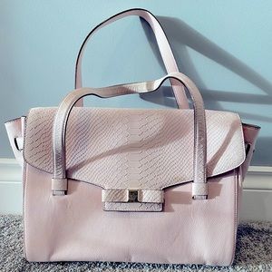 Kate Spade ♠️ authentic light pink Kate Spade purse with bow feature.